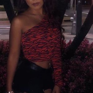 Urban outfitters. Zebra print, 1 sleeve top.